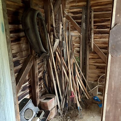 An Assortment of Vintage Agricultural, Woodworking, and Utility Tools Including Horse Collar 