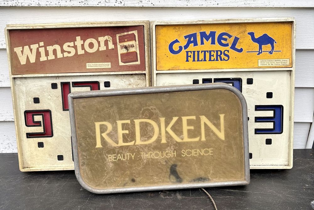 Lot 803: A Trio of Vintage Advertising Displays Including Camel and Winston Clocks and a Redken Lighted Sign
