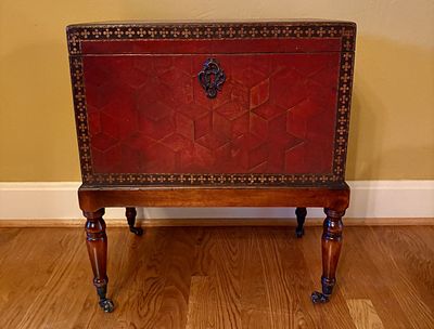 Red Tooled Leather Covered Chest on Stand. FOR PICK UP OR TRANSPORT ONLY, WILL NOT SHIP A 