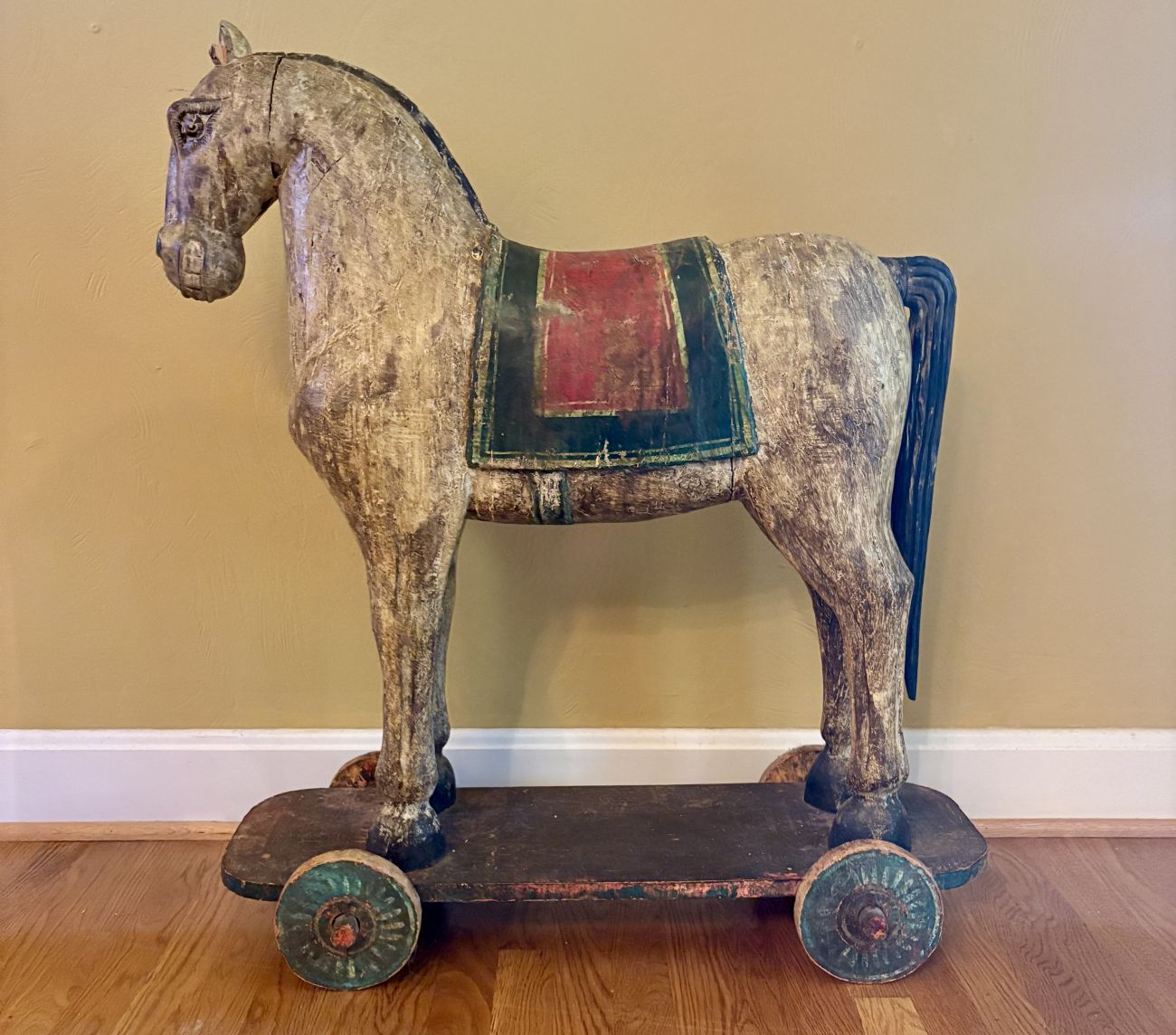 Large Carved Wooden Horse on Wheeled Platform