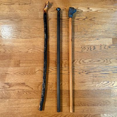 Three Vintage Walking Canes Including Blackthorn and Terrier Motif Sticks. A trio of vintage 