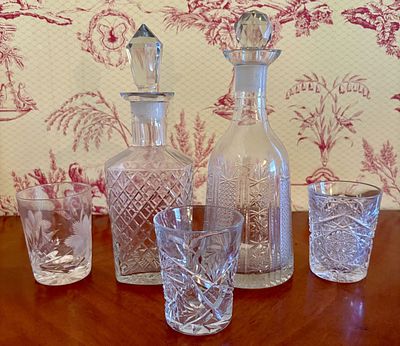 A Collection of Cut Crystal Decanters and Tumblers. A collection of cut crystal barware 