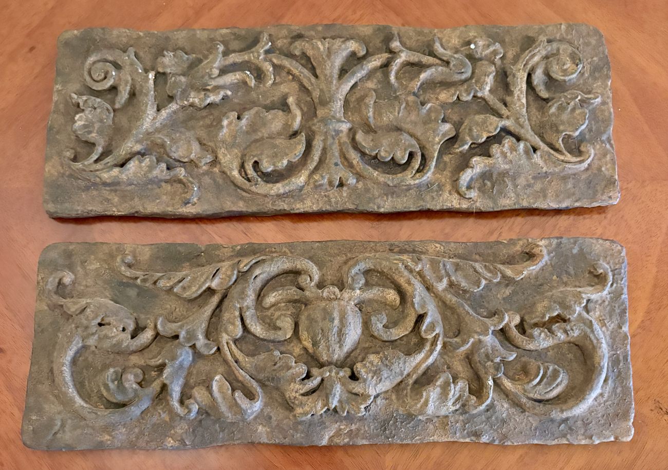 A Pair of Laville Composition Relief Wall Plaques with Acanthus Foliage