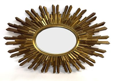 Mid-Century Gold Sunburst Mirror. Item/Description: Gold sunburst mirror featuring an oval 