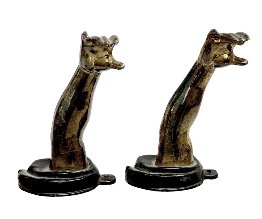 Petites Choses Gilt & Ebonized Figural Arm Hooks. Item/Description: Distinctive pair of 