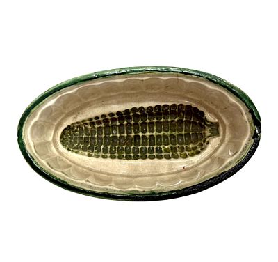 Glazed Stoneware Corn Bowl. Item/Description: Oval bowl mold featuring an impressed ear of corn 
