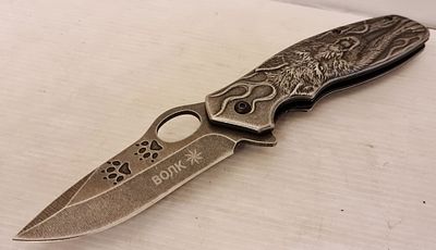 Wolf סכין כיס איכותית, מסיבית , עשויה פלדה בעבודת יד, ידיות עם תבליטי זאב. Wolf - סכין כיס 