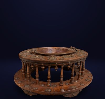 Brazier in carved and studded walnut and bronze, 18th century. Measurements: 34 x 76 x 76 cm.