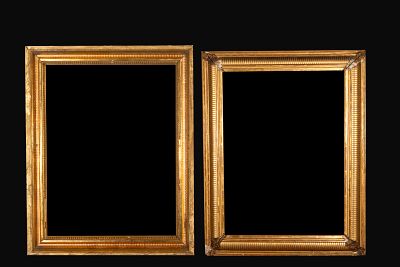 Pair of molded and gilded frames. Spain. 19th century. Carved and gilded wood. Both frames 