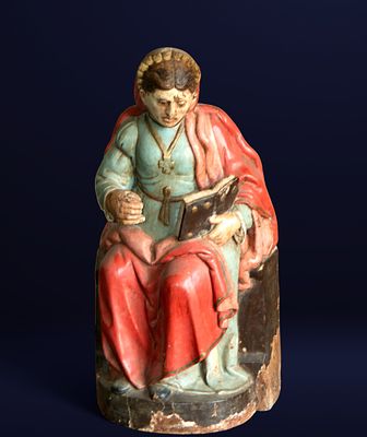 Virgin with book, Hispanic School, 17th Century. Carved and polychromed wood. Dimensions: 62 x 