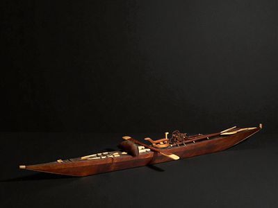 Model of an Inuit kayak with a wooden frame and sealskin covering, Canada, circa 1930–1940. Wood 