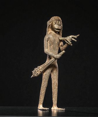 Mythical sculpture of a hybrid man-ape figure, 20th century. Cast bronze. Dimensions: 62 &times; 21 &times; 