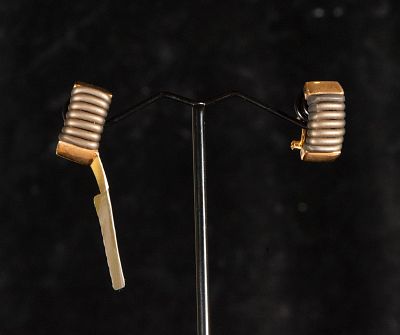 18k yellow gold earrings with brown rubber. Total weight 6.19 g. Earrings set in 18-karat yellow 