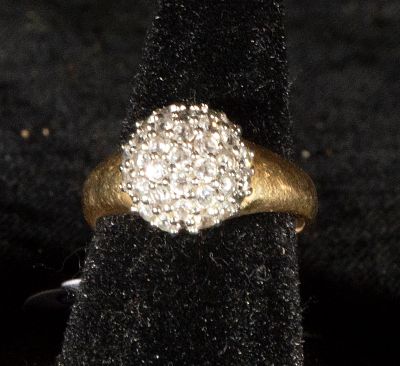 Diamond rosette ring. 18k yellow gold. Ring crafted in 18-karat yellow gold, featuring a 