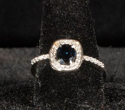 18k two-tone gold brooch decorated with 24 old rock-cut diamonds with an estimated total weight 