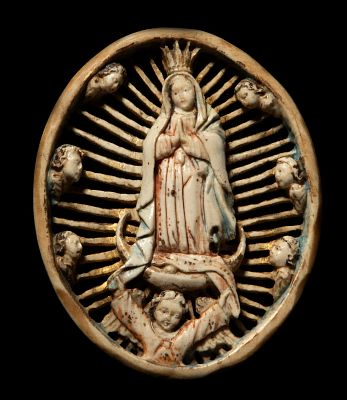 Exquisite 17th-century colonial medallion of the Virgin of Guadalupe in bone. Measurements: 8.7 