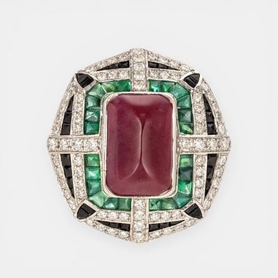 Ring with diamonds of approx. 4.50 ct, treated natural ruby ​​of approx. 10 ct and emeralds of 