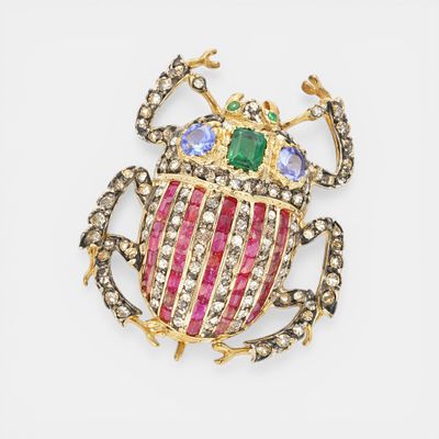 Brooch with natural rubies of approx. 2 ct, tanzanites of approx. 0.50 ct, central natural 