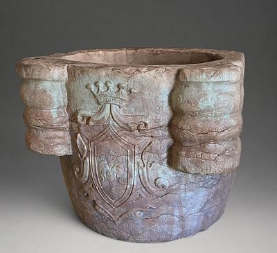 Armorial mortar with fleur-de-lis, France, 17th century. Carved stone. Measures 42 x 63 cm. An 