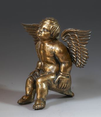 Seated angel with outstretched wings, France, 17th century. Gilded bronze. Measures 43 x 54 cm. 