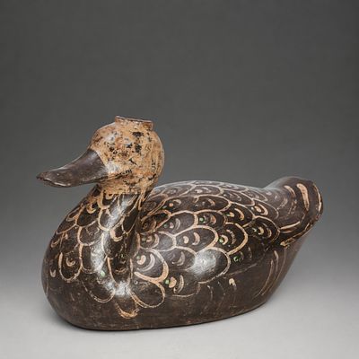 Duck-shaped vessel, China, Han Dynasty. Terracotta with slip and beige, brown, and green 