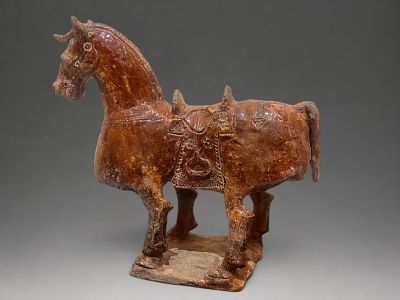 Funerary horse Mingqi, Chinese school, 3rd - 6th century. Partially glazed terracotta in an 