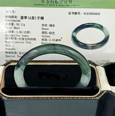 Vintage bracelet made of natural jadeite jade with CQT Beijing certificate, weight 36.11 g. Vinta 