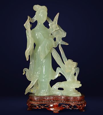 Geisha in jade, 20th century. Jade. Measurements: 21 cm x 12 cm x 9 cm