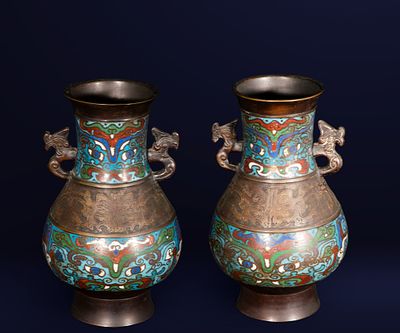 Pair of bronze and cloisonn&eacute; enamel vases with stamp. Japanese school. Meiji period, 19th century. 