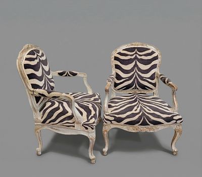 PAIR OF ARMCHAIRS, CARVED AND POLYCHROME WOOD, ZEBRA-PRINTED UPHOLSTERY, LOUIS XV, CIRCA 1790 – 