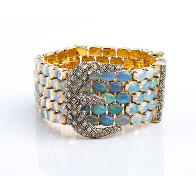 Important Hinged Bangle Bracelet in Gilt Silver with Opals and Rose-Cut Diamonds. A rigid 