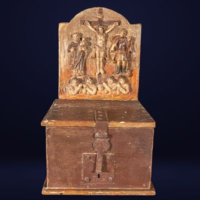 Alms chest with a relief of the crucifixion. 18th-century Colonial School. Carved wood. 