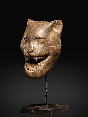 Leopard head mask. Benin, 20th century. Wood. Dimensions: 10 &times; 14 &times; 6 cm. Small wooden mask 