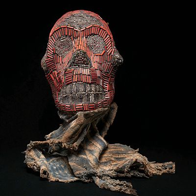 Ceremonial monkey skull, Grasslands, Cameroon, 20th century. Skull decorated with glass beads 