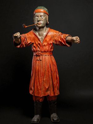 Advertising sculpture for a tobacconist's shop with a figure smoking a pipe, France, 19th century. 