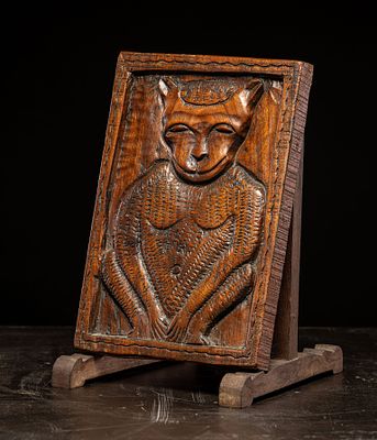 Relief carved with an anthropomorphic monkey, France, 19th century. Carved wood. Dimensions: 30 
