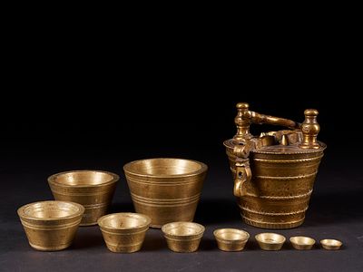 Copper alloy weights. West Africa, 20th century. Copper alloy. Dimensions: 9.8 &times; 9.4 cm. Set of 