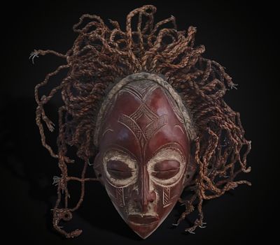 Polychrome ritual mask, Nigerian culture, 20th century. Carved and polychromed wood. Nigerian 