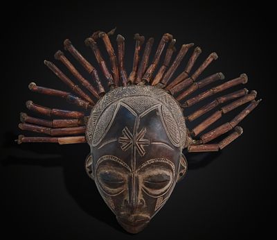 Ritual mask, Togo culture, 20th century. Carved wood. Large-format mask from the Togo culture 