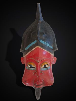 Polychrome ritual mask, Benin culture, 20th century. Carved and polychromed wood. African ritual 