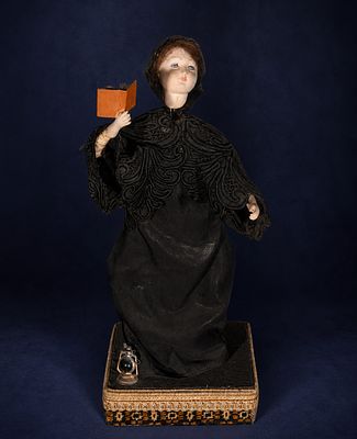 Automaton of a reader with a book, European school, 19th century. Automaton depicting a female 