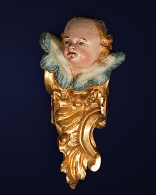 Finial with angel's head, Spanish School, 18th Century. Carved, polychromed, and gilded wood. 