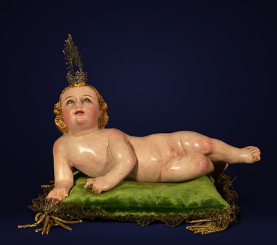 CASPICARA CIRCLE. QUITO SCHOOL, ECUADOR, 19TH CENTURY - Reclining Child Jesus. Carved and 