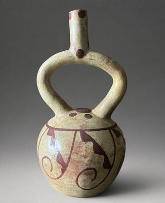 Stirrup vessel with geometric decoration, Moche Culture, 200-800 AD. Modeled and painted 