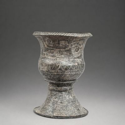 Ban Chiang Vase, Thailand, 15th-5th century BC. Modeled and incised terracotta. Measures 37 x 