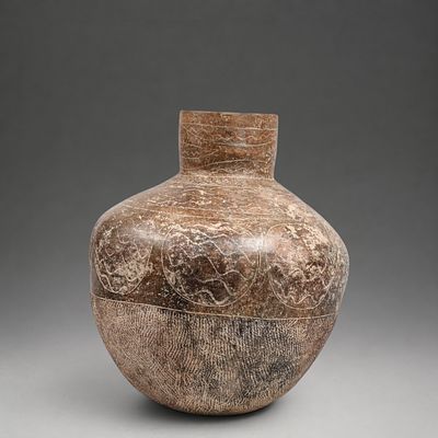 Ban Chiang Vase, Thailand, 15th-5th century BC. Modeled and incised terracotta. Measures 38 x 