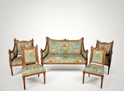 Five-piece parlor set. Louis XVI style. French School. 19th century. Carved and gilded wood with 
