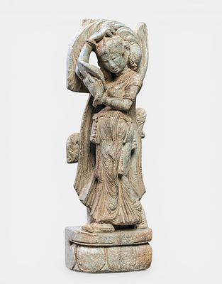 Stone sculpture of a Devata or celestial nymph in medieval Indian style. Probably from Rajasthan 