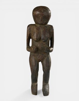 Pair of anthropomorphic hardwood statues. Carved from a single piece of wood, these figures 