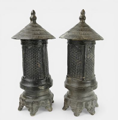 Pair of Chinese barn models. Ming Dynasty. 1368 to 1641. On a stand with a molded conical lid 
